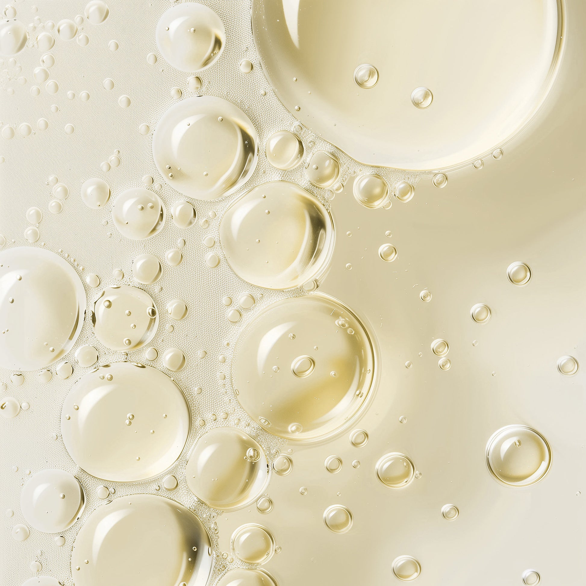 SACRAHAUS Botanical hair growth serum with light yellow bubbles in oil for nourishing hair care
