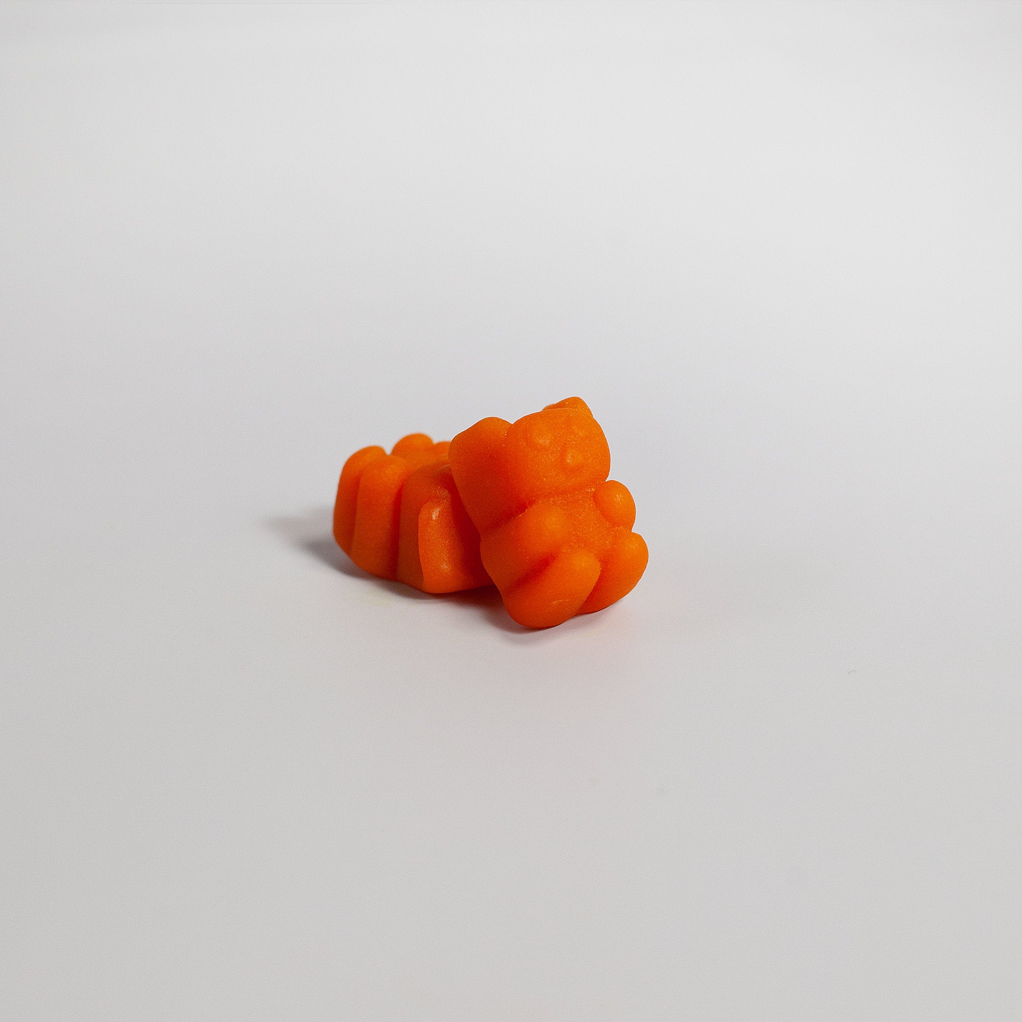 SACRAHAUS turmeric gummies for inflammation in vibrant orange color, packed for health benefits