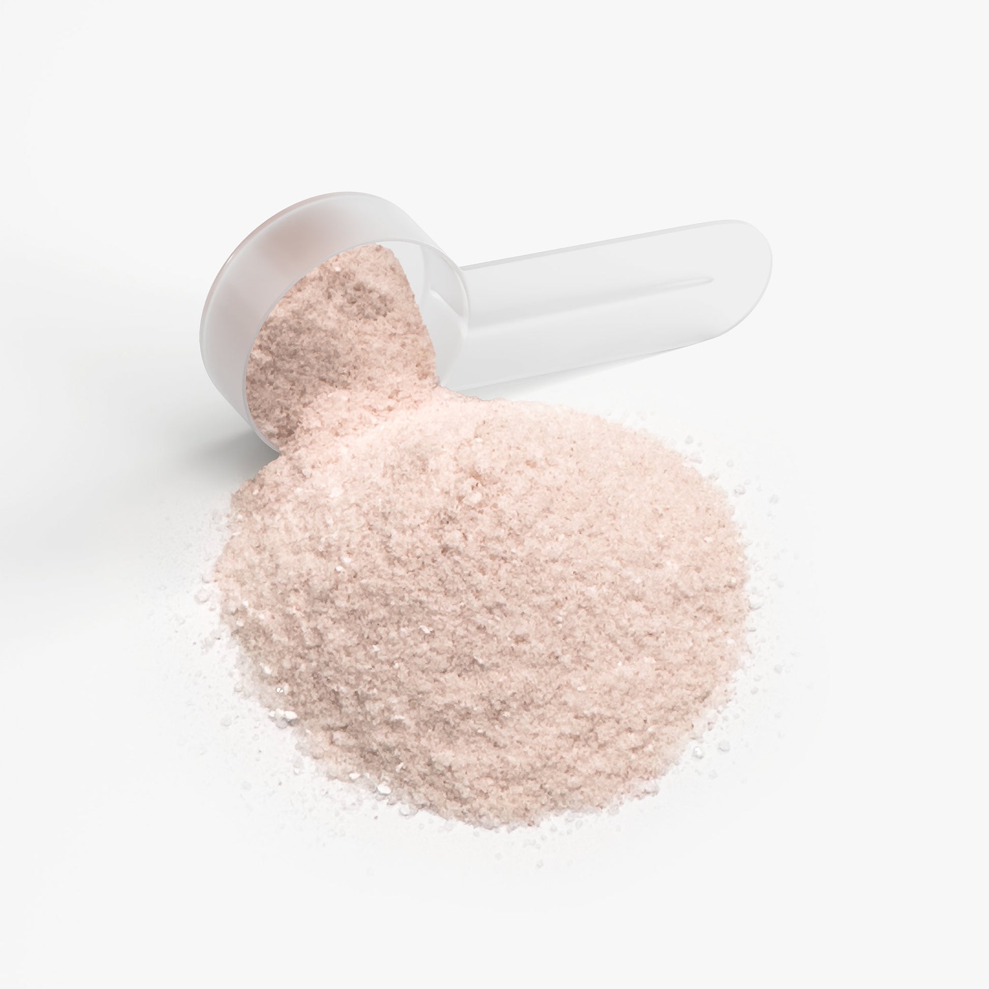 SACRAHAUS vegan hydration powder peach mango in a clear scoop with powder spilling out